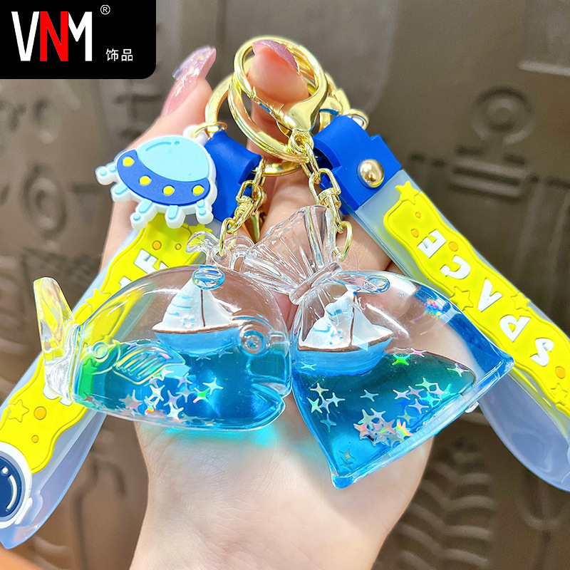Oil blue sailing floating bottle keychain cute liquid quicksand car pendant bag small gift wholesale