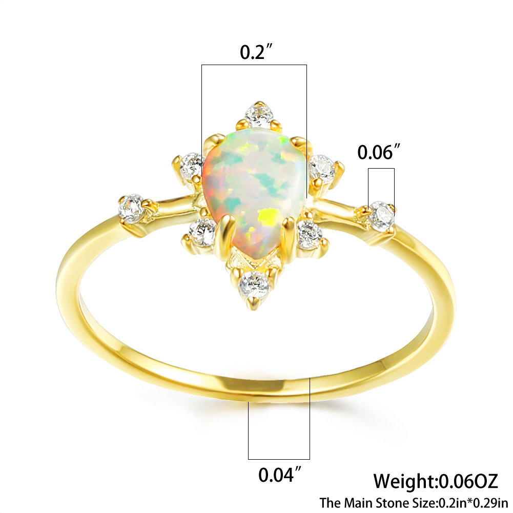 s925黄金水滴白澳宝边白钻戒指