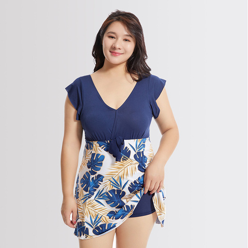 Plus-size swimsuit for women: trendy summer design with conservative print, loose-fitting, and relaxed-fit swimwear perfect for fuller figures.