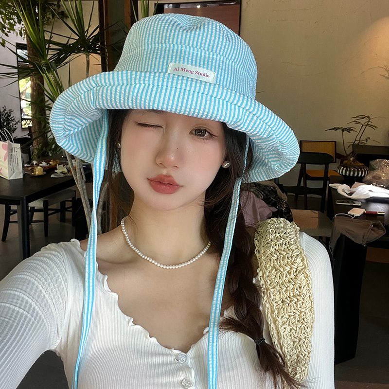 Girl honey coreano pequeño sombrero de pescador a rayas frescas para mujeres de verano 2024 nuevo sombrero solar pequeño para mostrar la cara