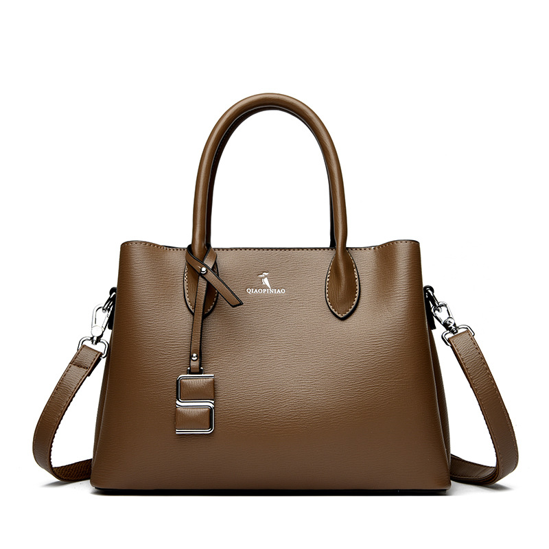 Nuevo bolso de mujer simple de moda, bolso de mano de cuero suave de gran capacidad, bolso de tela de mujer, bolso de canguro