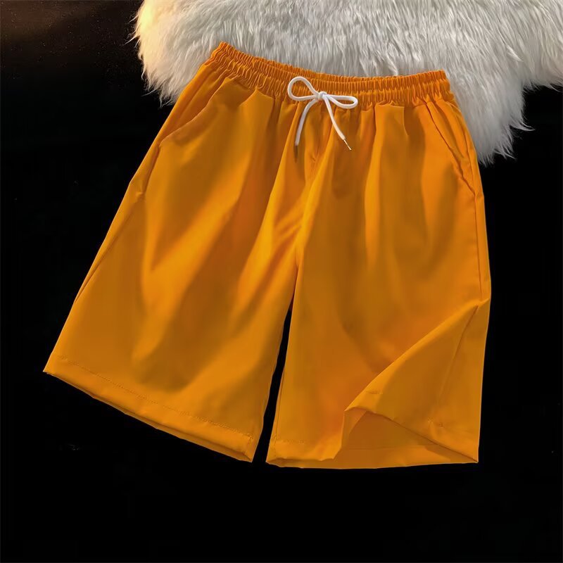 Personalizado al por mayor caramelo de viento neutro multicolor 25 colores primavera y verano nuevos pantalones cortos casuales de cinco puntos sueltos y cómodos