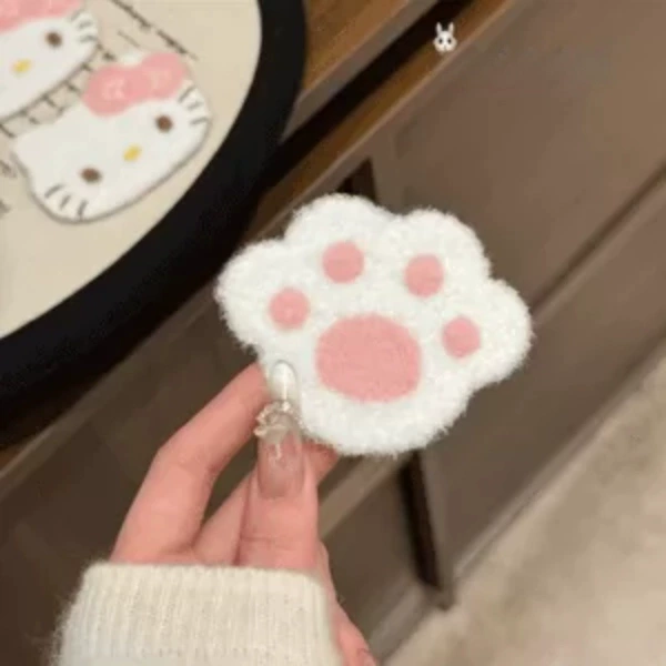 White cat paw