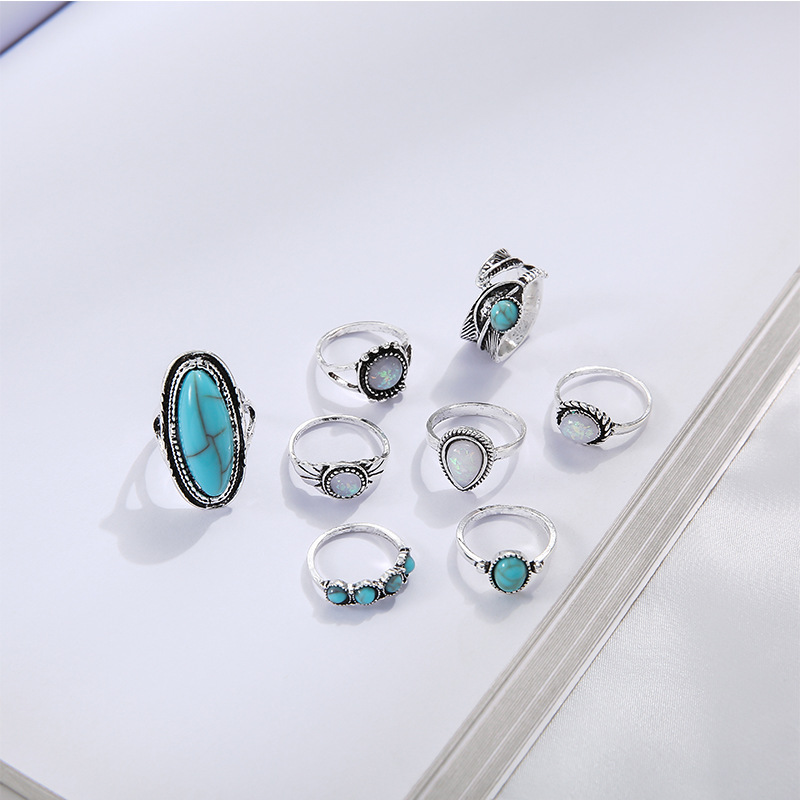 Retro Inlaid Turquoise Carved Feather Alloy Ring 8-piece Set display picture 7