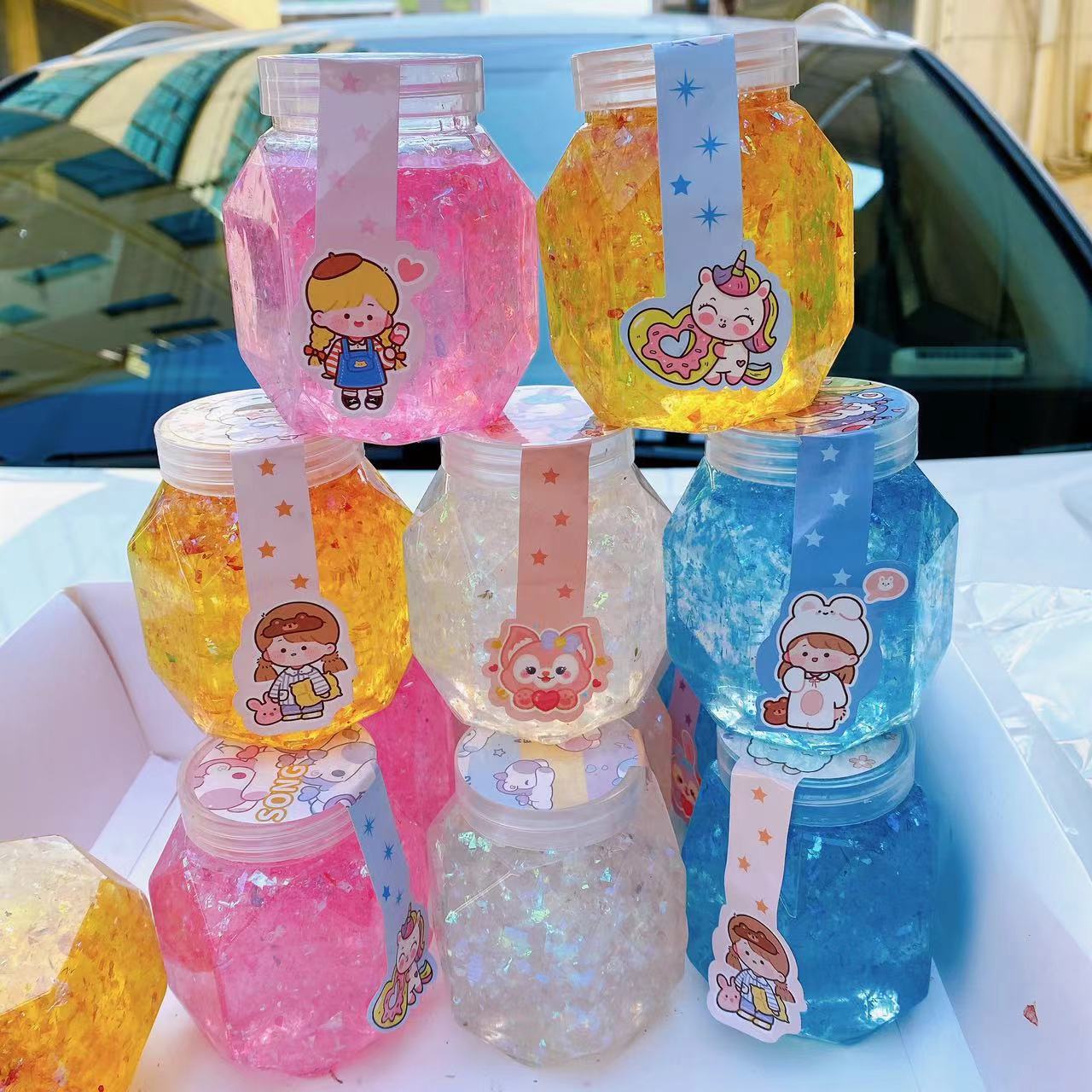 Juguetes para niños barro de color barro de cristal goma espumante alta permeabilidad color brillante barro hexagonal DIY descomprimido 2 yuanes al por mayor