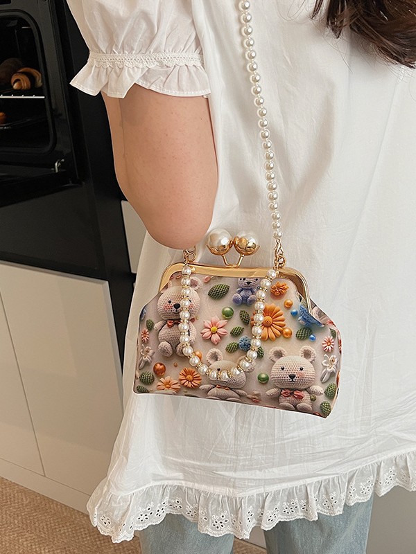 Bolso de mujer 2025 nueva impresión de tela lindo oso bolsa de cena concha de cadena de perlas bolso de mochila