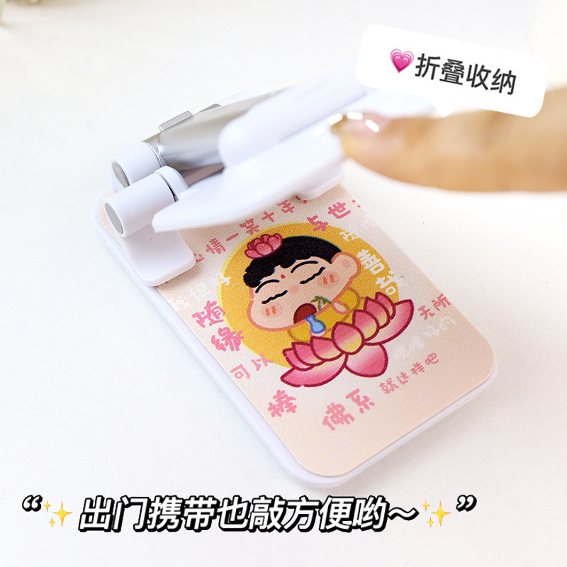 漫画しんちゃん携帯電話スタンド怠け者デスクトップはiPadタブレット共通折り畳み多機能を適用して昇降を調節できる|undefined