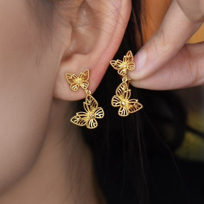 Pendientes de clip Xuping de aleación de cobre con baño de plata, diseño elegante y exclusivo, aretes graciosos y dinámicos para mujeres sin perforaciones en las orejas.