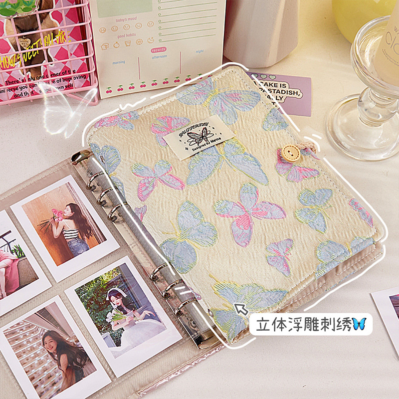 Álbum de tarjetas de mariposa de alto valor, nicho, álbum de fotos en relieve tridimensional Polaroid, niña persiguiendo estrellas, libro de almacenamiento de tarjetas pequeñas de 3 pulgadas