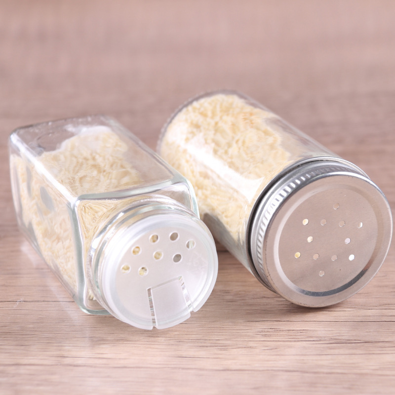 Botella de condimento de vidrio transparente cuadrada sellada cubierta abierta botella de condimento de cocina botella de condimento fábrica directa