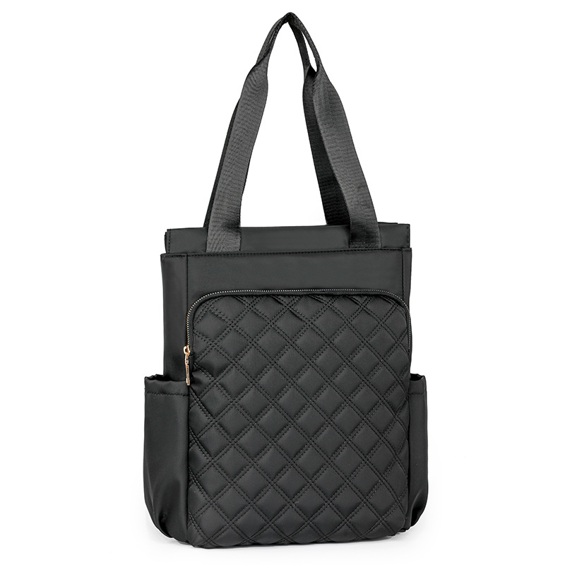 Mochila de mujer salvaje de color puro 2024 nueva mochila portátil de moda, bolso de viaje ligero y de gran capacidad