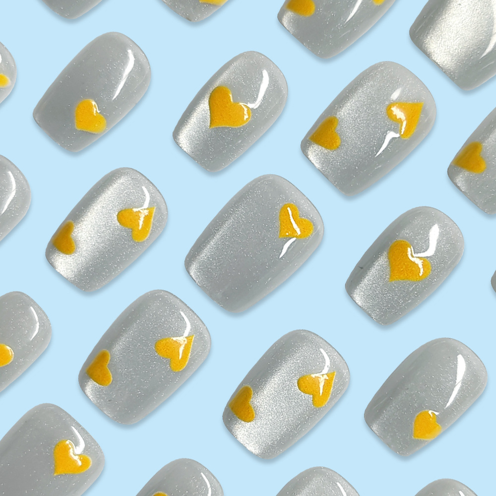 Ventas de chatarra encantadoras uñas de corazón amarillo dulce parche de uñas de ballet corto 30 piezas de uñas de ojo de gato