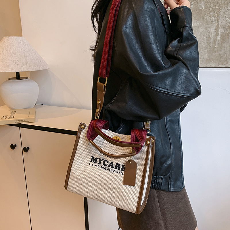 Gran capacidad de viaje al trabajo bolso de mano para mujeres 2024 nuevo lino retro color contraste mochila de hombro