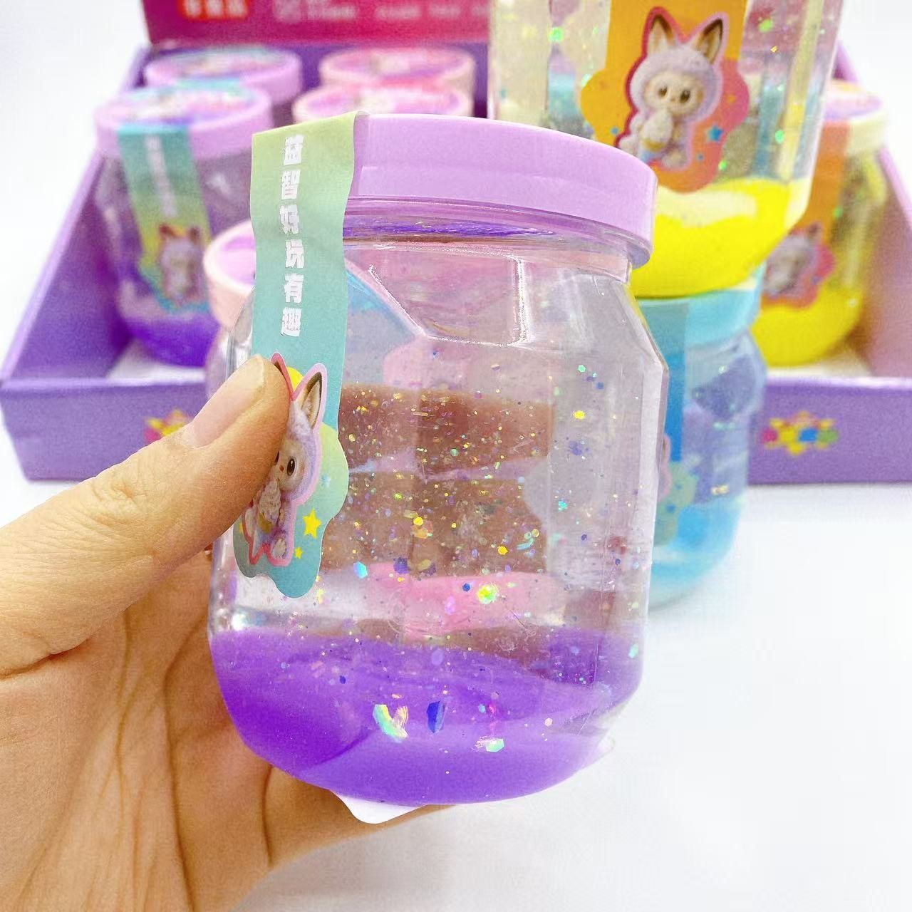 Lodo de dibujos animados de lápido colorido transparente de alta transparencia precio de subida Slime DIY hecho a mano material descomprimido lote de juguetes