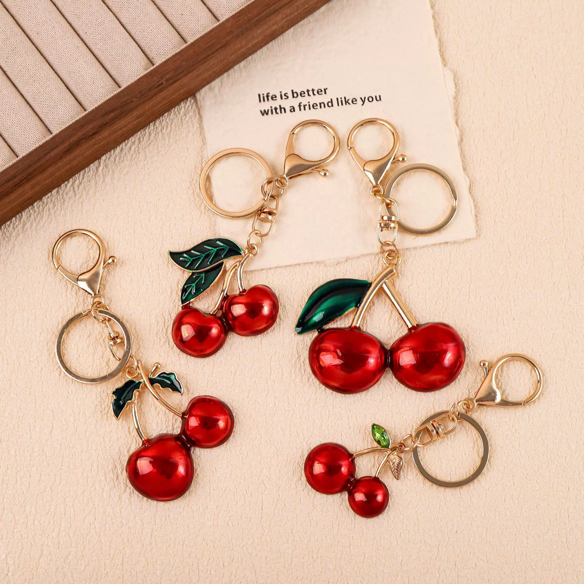 新款合金滴油樱桃钥匙扣轻奢风创意个性汽车钥匙挂饰背包配饰挂件