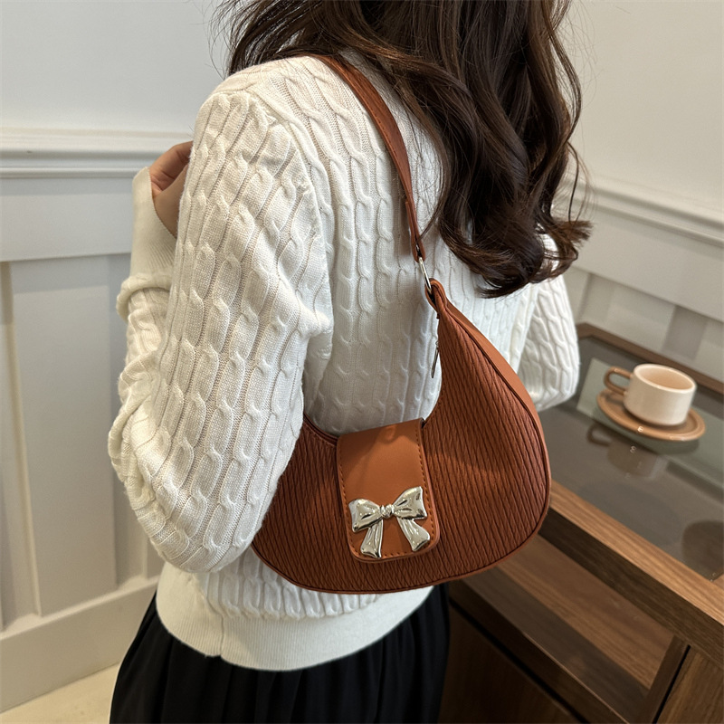 Bolsa debajo de la axila temperamento de alto valor facial bolso de mujer nicho de diseño bolso de hombro de invierno 2024 nuevo temperamento de arco mujer