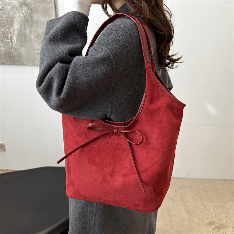 Bolsa de viaje al trabajo para mujeres estilo coreano retro de alta capacidad bolso de brazo 2025 primavera alta sensación bolso de hombro