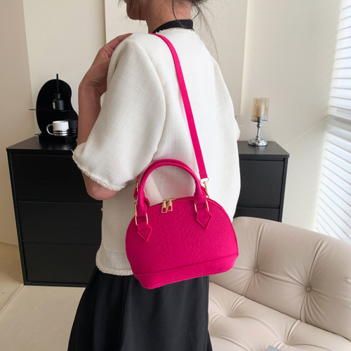 This year's popular women's  spring new fashion retro hand-held shell bag, casual shoulder bag, crossbody bag