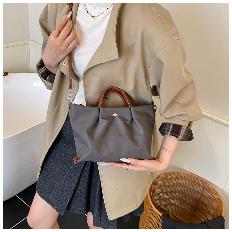 Borsa a tracolla casual da donna in tessuto Oxford, capiente, elegante e versatile, ideale per gli spostamenti quotidiani._voghion.com