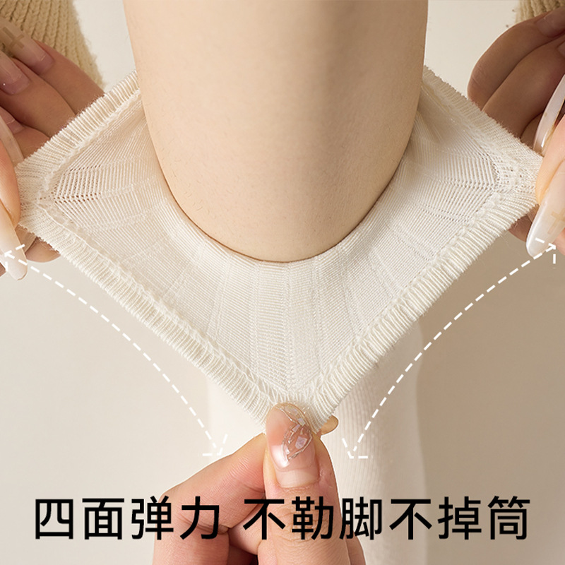 Mujeres primavera y verano, calcetines verticales, calcetines deportivos antibacterianos al por mayor, calcetines de mujer sin hueso de color sólido.