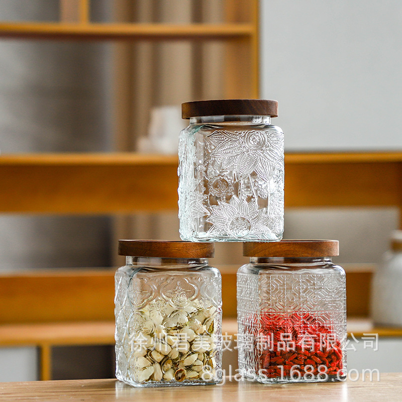 Tarro sellado de vidrio para el hogar al por mayor de fábrica Tarro de almacenamiento de flores de begonia cuadrado retro Tarro de té Tarro de almacenamiento de frutas secas
