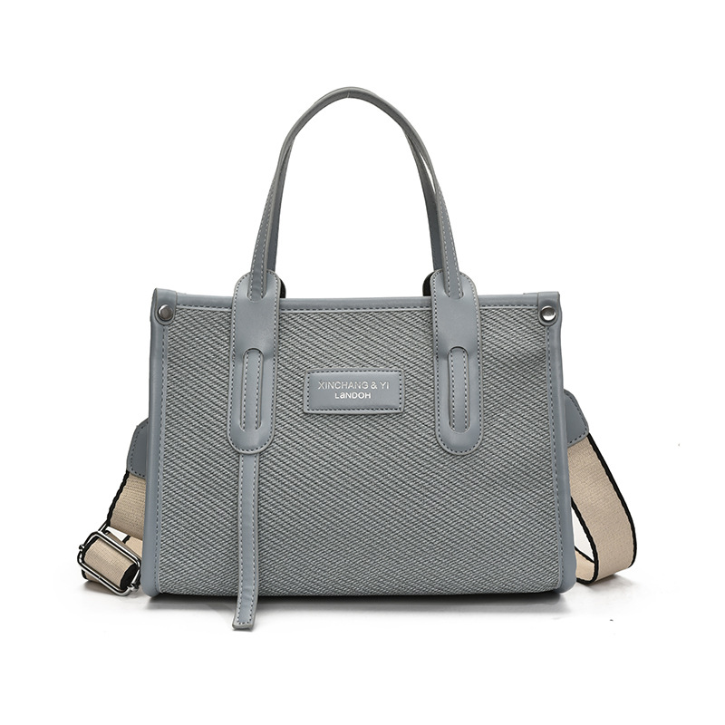 Bolso de gran capacidad para mujer 2025 verano nuevo estilo moda contraste color costura mensajero bolso simple de viaje