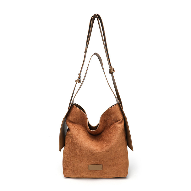 Bolso especial de orejas colgantes de songmont bolso de mujer grande y medio de cuero suave universal de un solo hombro bolso de mano