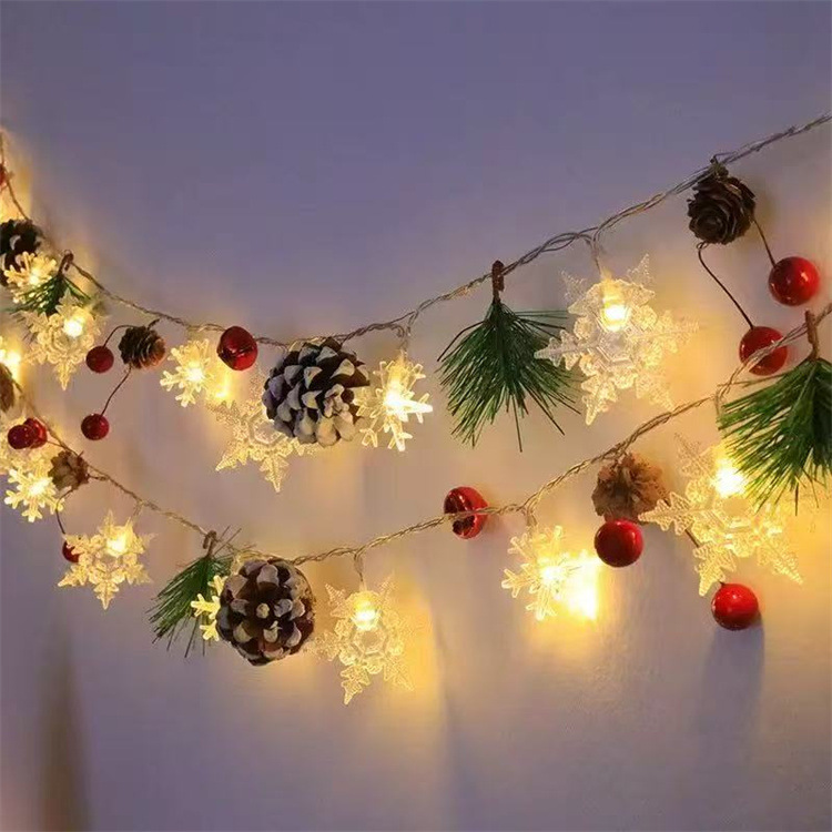 2 metros, 20 luces, estilo copo de nieve con piñas.