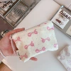 Light blue polka dot pink bow