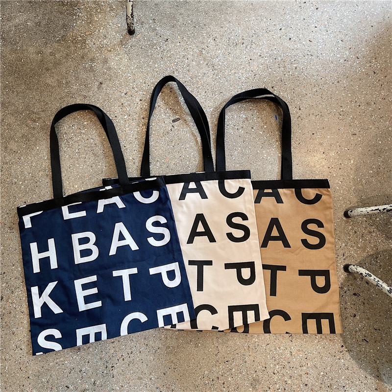 12281 South Korea same letter logo lazy style large capacity shopping bag canvas bag wholesale three colors