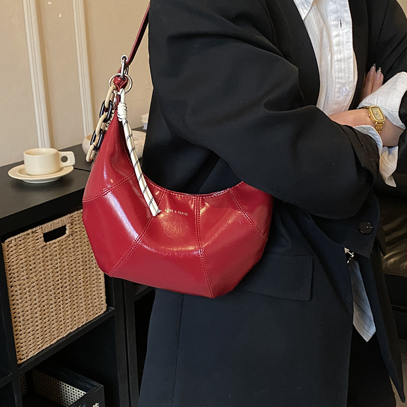 Transfronterizos coreanos perezosos bolsas de brazo de cera nicho bolsas de cuerno de piel de cera 2026 nuevas bolsas de brazo diarias mujeres