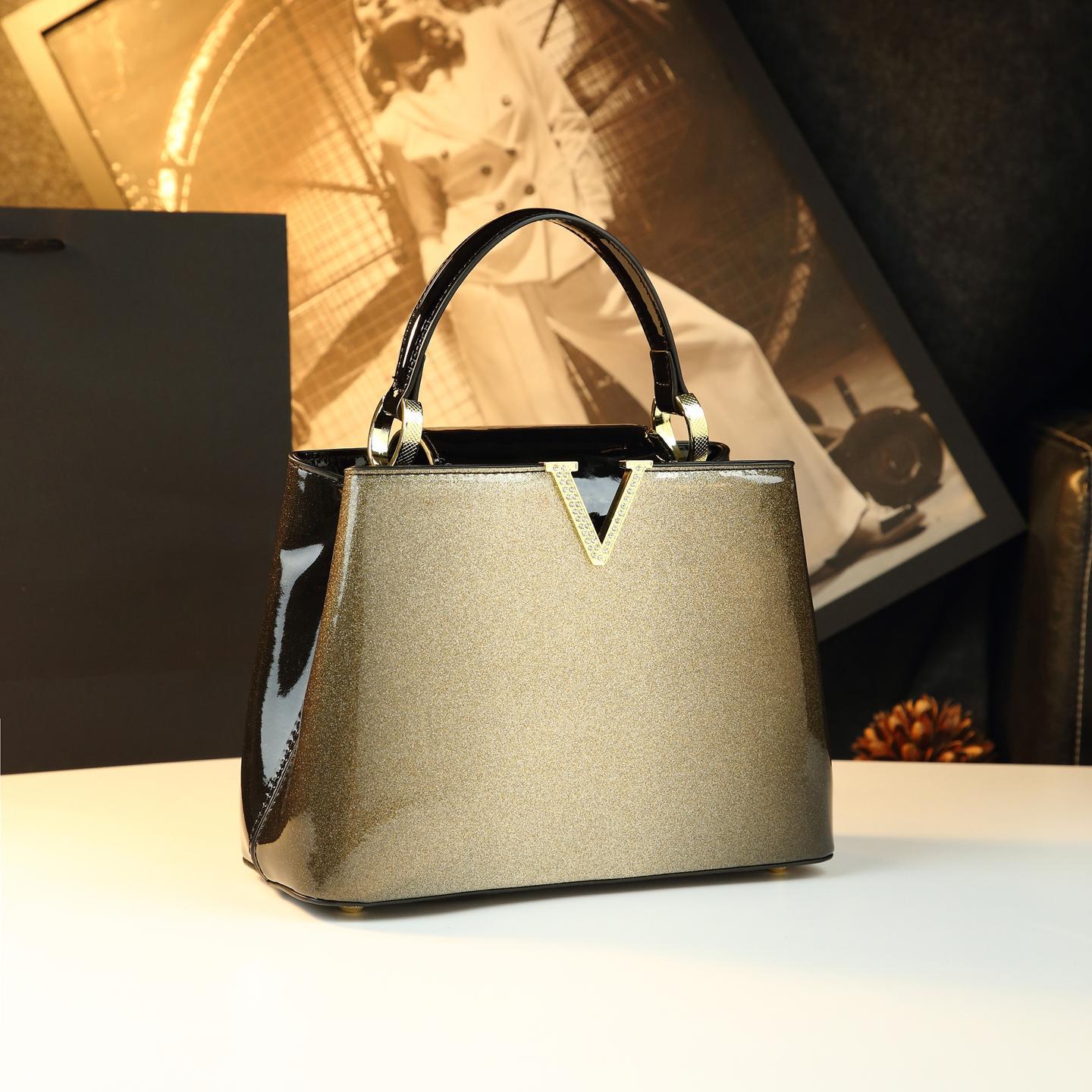 Bolso de gran capacidad para madres 2025, nuevo temperamento lujoso, bolso de mano de mujer de hombro de moda, bolso de cuero de mediana edad.