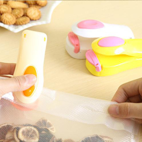 Household portable mini plastic bag sealing machine snacks small hand pressure heat sealing machine plastic sealing machine sealing clip wholesale