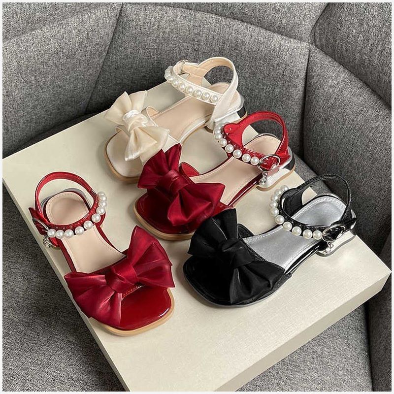 Kinder Sandalen 2023 Sommer Neue Mittlere und Große Mädchen Weiche Sohle Kleine High Heel Bogen Mädchen Prinzessin Schuhe_voghion.com