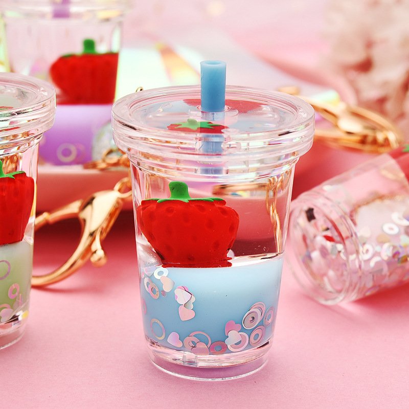 Creative Floating Strawberry Milk Tea Cup Keychain Wholesale Nihaojewelry display picture 3