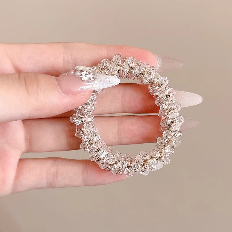 Sensación de alto nivel Versión coreana de diamante flash anillo para el cabello cuerda para la cabeza mujer 2024 nuevo estilo cola de caballo alta corbata fija banda de goma para el cabello accesorios para el cabello
