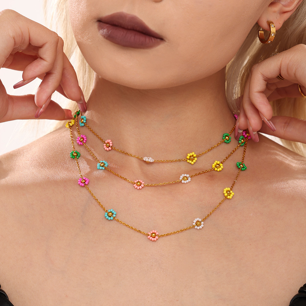 Dongguan Jiaqing Joyas de acero inoxidable hechas a mano pura flores de color japonesas importaciones de collar de cuentas de vidrio conjunto de pulseras mujeres