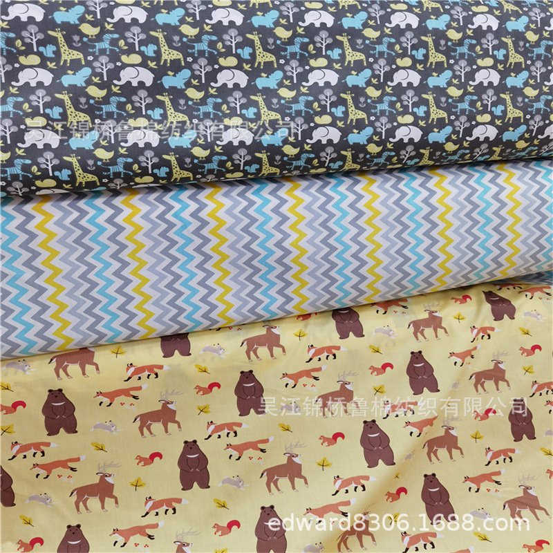 涤棉卡通印花衬衫布45*45无荧光A类儿童有机棉涤交织牛津纺印花布