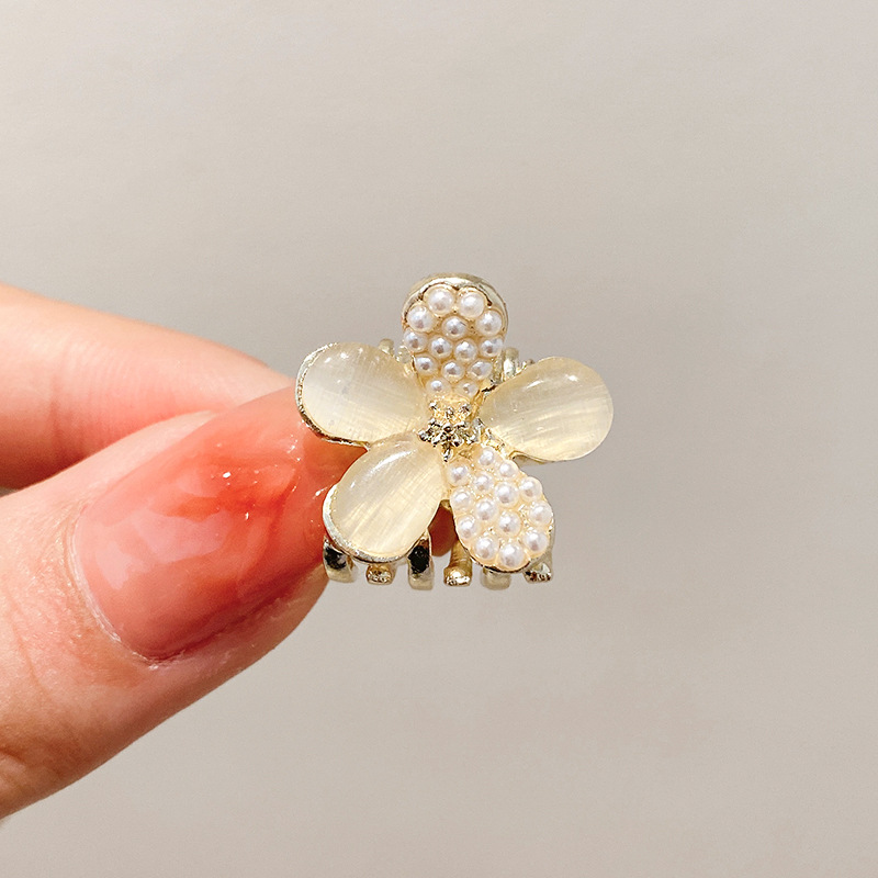 Pequeñas pinzas de cabello de perla temperamento feminino medio agarrado pinzas de cabello de borde pequeño adornamiento de cabeza de alto nivel no lastimar pinzas de cabello