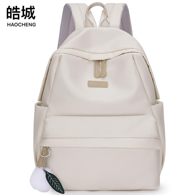 Spot al por mayor 2023 nueva mochila de tela Oxford para mujer coreana simple y versátil mochila para computadora de gran capacidad marea