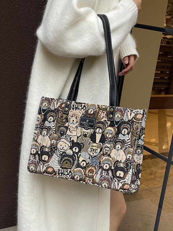 Bolsa de lona impresa de dibujos animados para mujeres 2024 nueva bolsa de gran capacidad, bolsa de hombro de viaje casual versátil