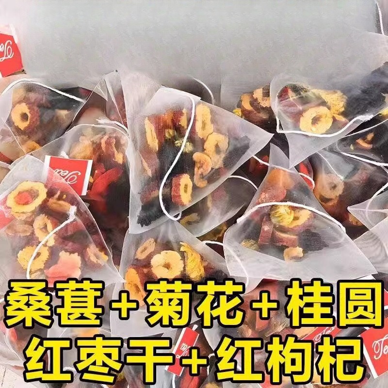 桂円クコの胎菊の桑の実の赤いナツメのお茶は元の材料の三角を選んで養生のお茶を包みます。|undefined