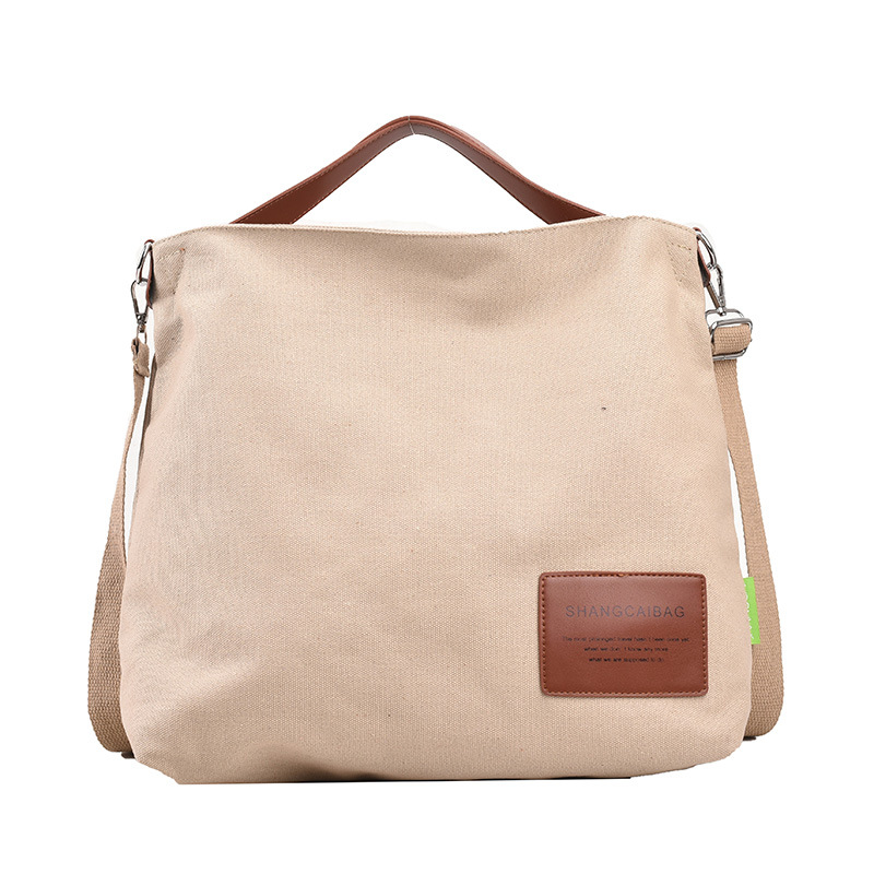 2022 nuevo estilo coreano de moda de gran capacidad bolsa de compras bolsa simple bolsa de lona bolsa de mensajero ocasional del hombro de las mujeres