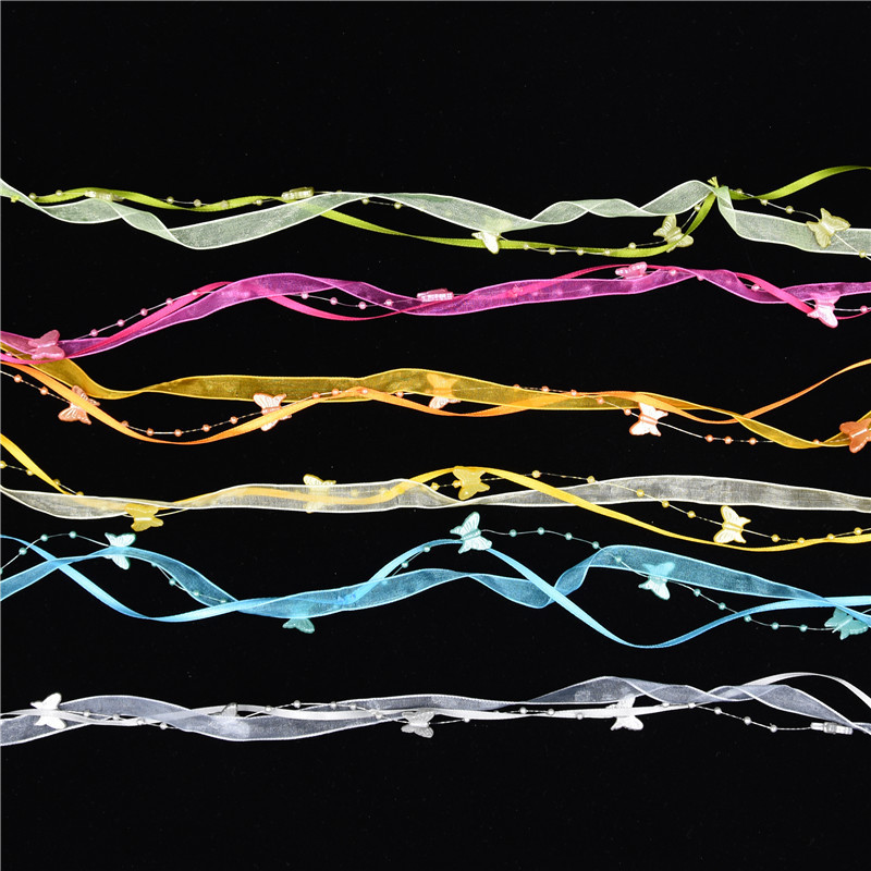 Nuevo transfronterizo primavera mariposa cadena de cuentas decoración cinta de mano material de jardinería de poliéster tejido a mano cinta