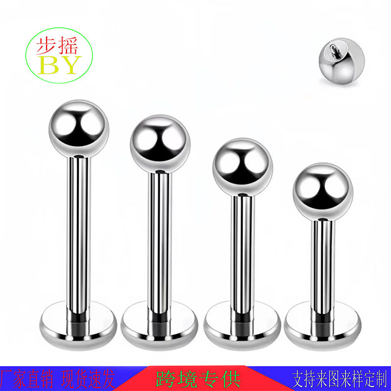 Metal earrings, lip piercing