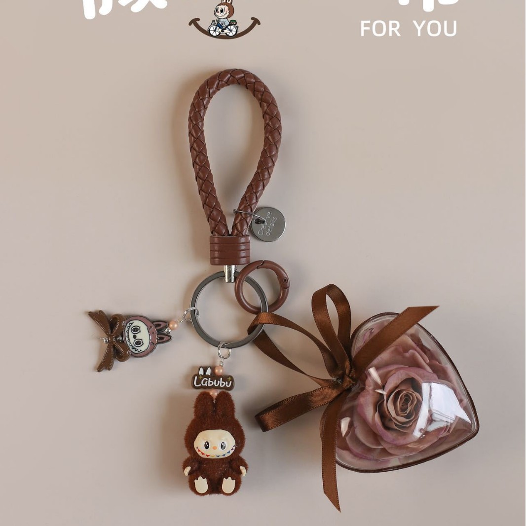 갈색 웃는 천 열쇠고리