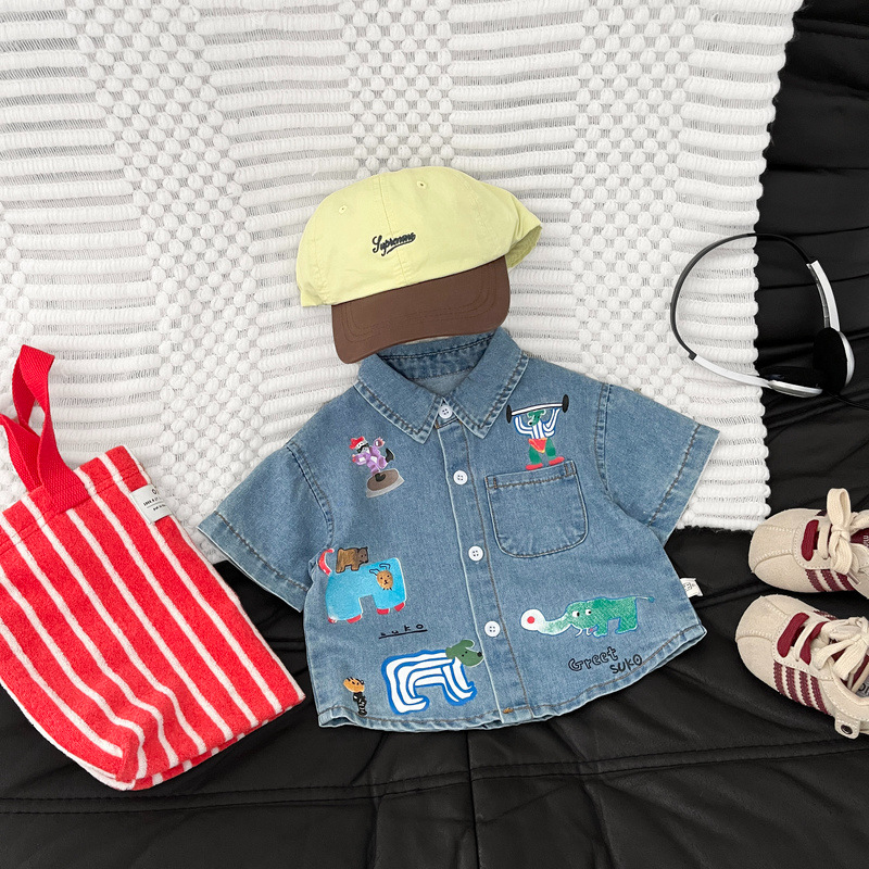 Camisas creativas coreanas de dibujos animados para niños graffiti vaqueros para bebés de verano sueltas camisas de moda de manga corta para bebés