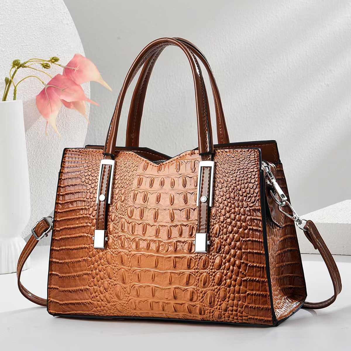 Emperor rinoceronte retro nicho bolso de mano mujer 2025 primavera y verano patrón de cocodrilo todo fósforo pequeño bolso de transporte nuevo