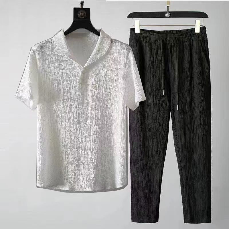 075 white top and black trousers