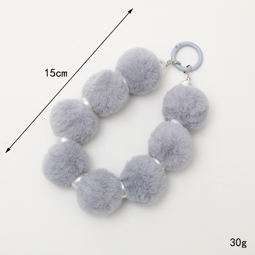 Autumn and winter new Korean version plush ball pendant handmade beaded mobile phone pendant short bracelet anti-lost chain for women